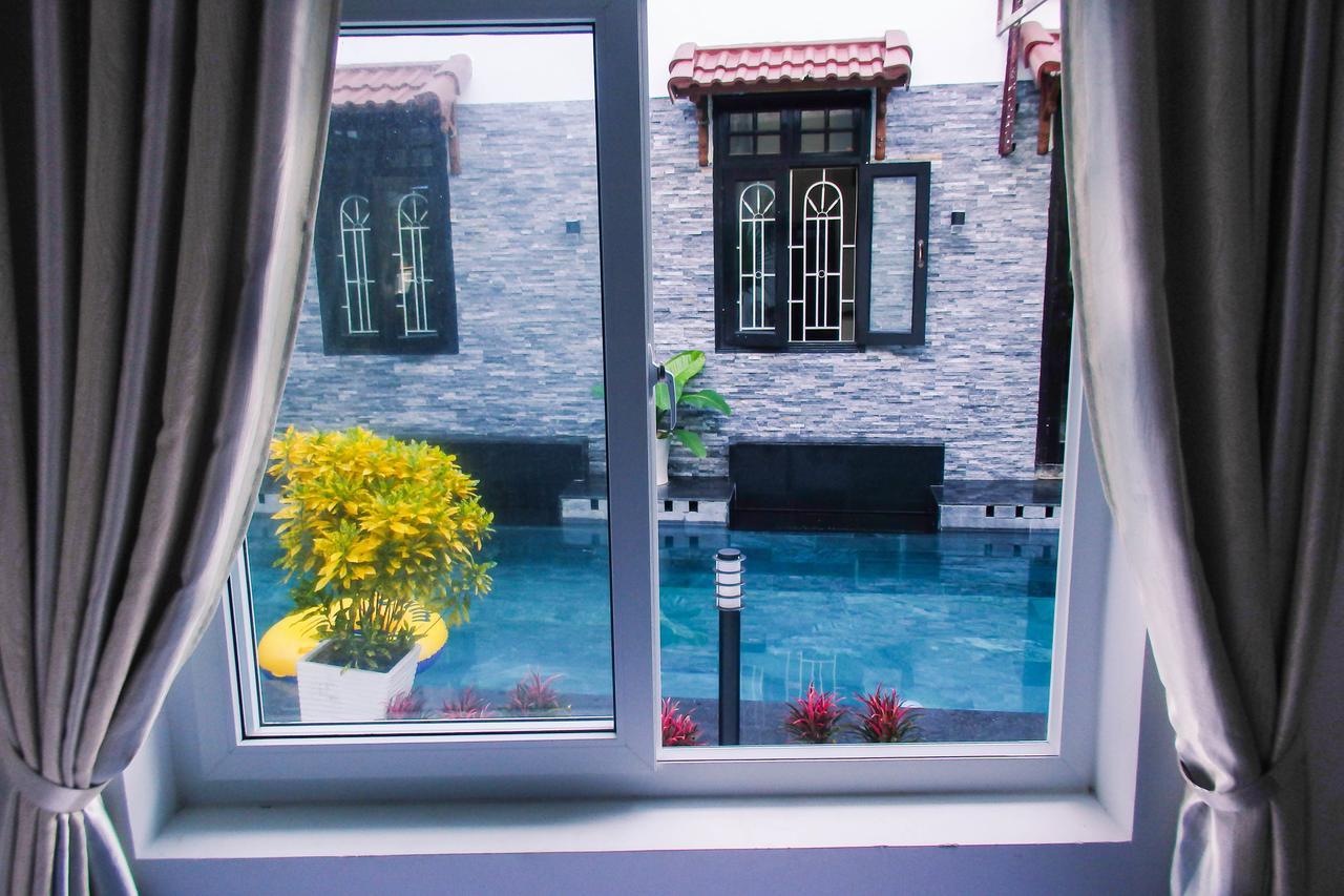 Ngoc Sinh Homestay Хойан Экстерьер фото